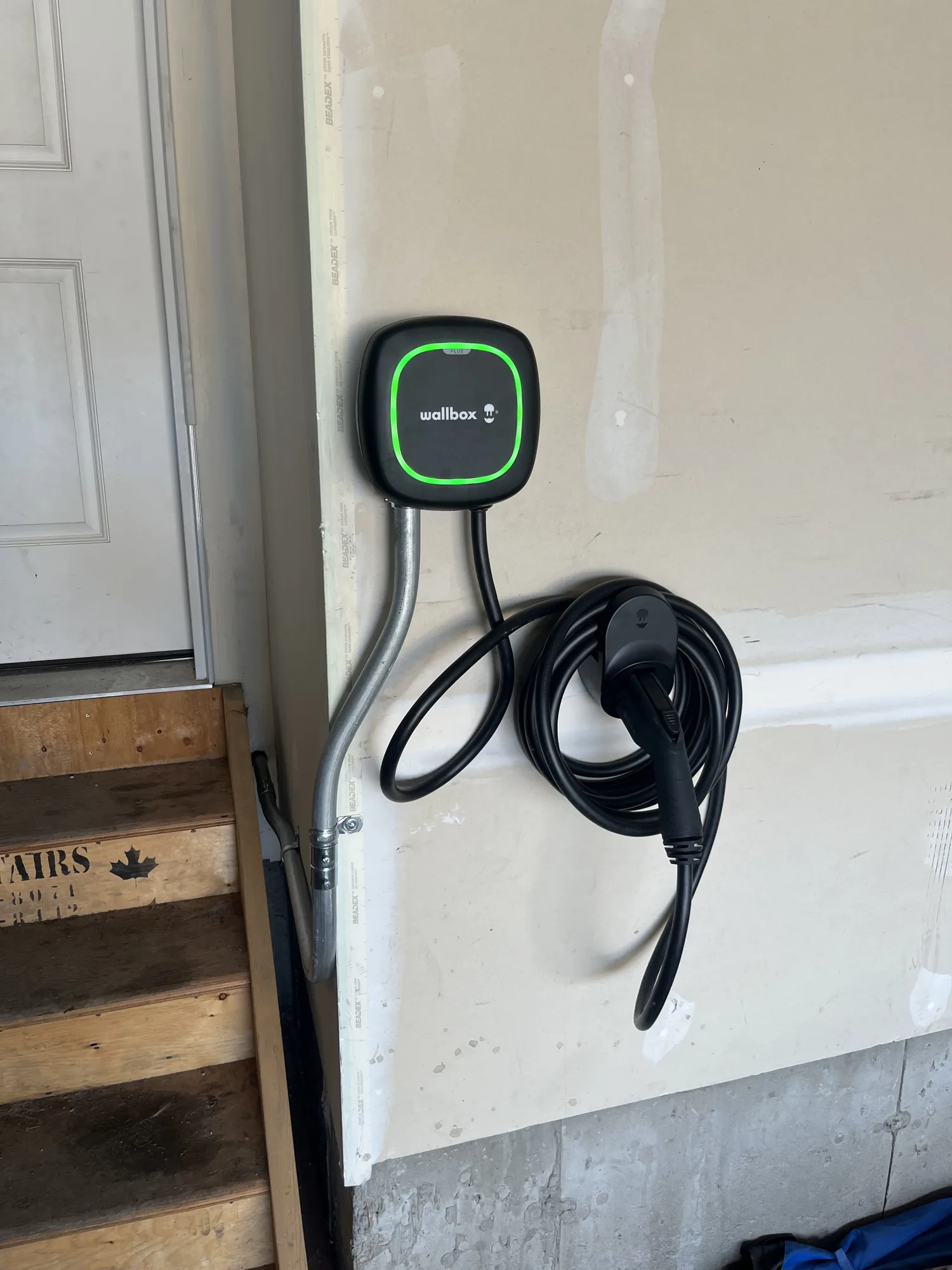 Wall-mounted home charger